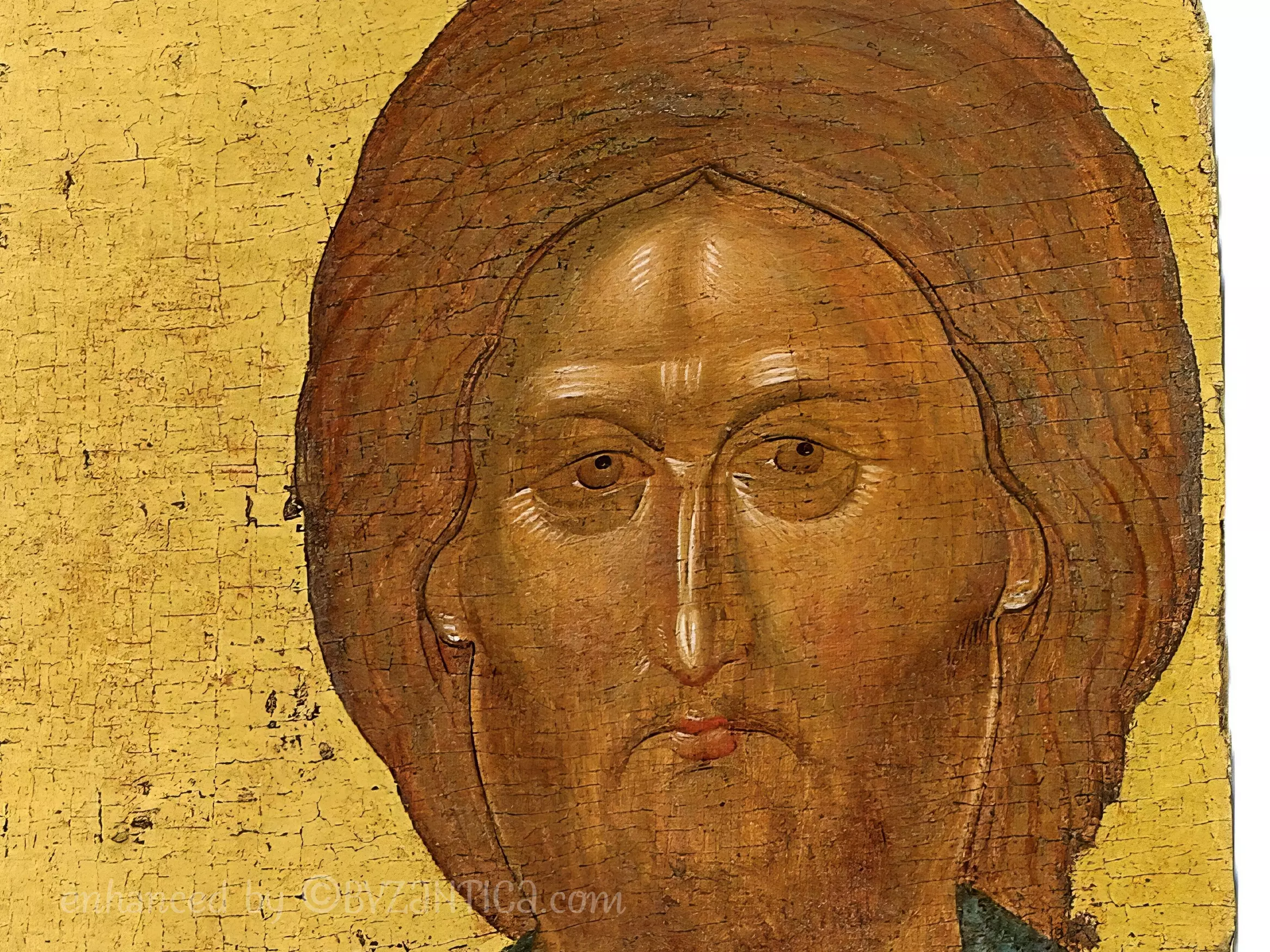 Close-up detail of the Pantocrator icon of Vatopedi showing Christ's face against gold leaf