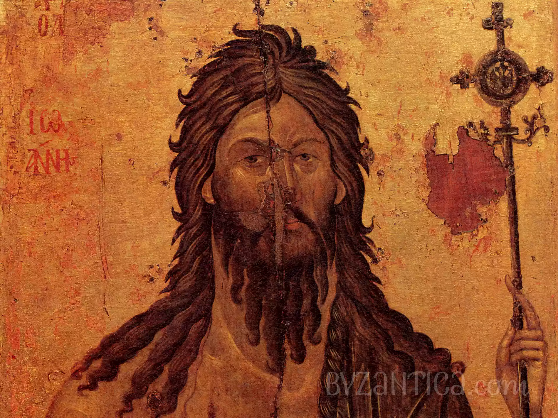 Striking facial detail from John the Forerunner in Kerkyra Byzantine icon showing intense gaze and wild hair