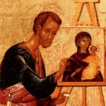 Detail showing Saint Luke's contemplative face in three-quarter view from a 16th century Byzantine icon depicting him painting the Virgin Hodegetria