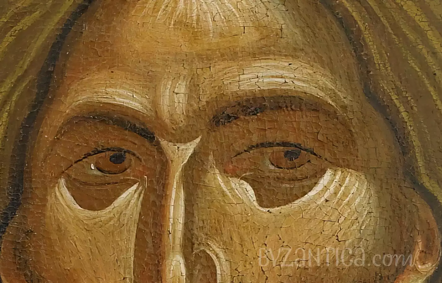 The eyes of Christ in this detailed view reveal the masterful technique