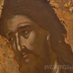 Detailed close-up of Saint John Baptist in Princeton icon showing the saint's intense expression against golden background