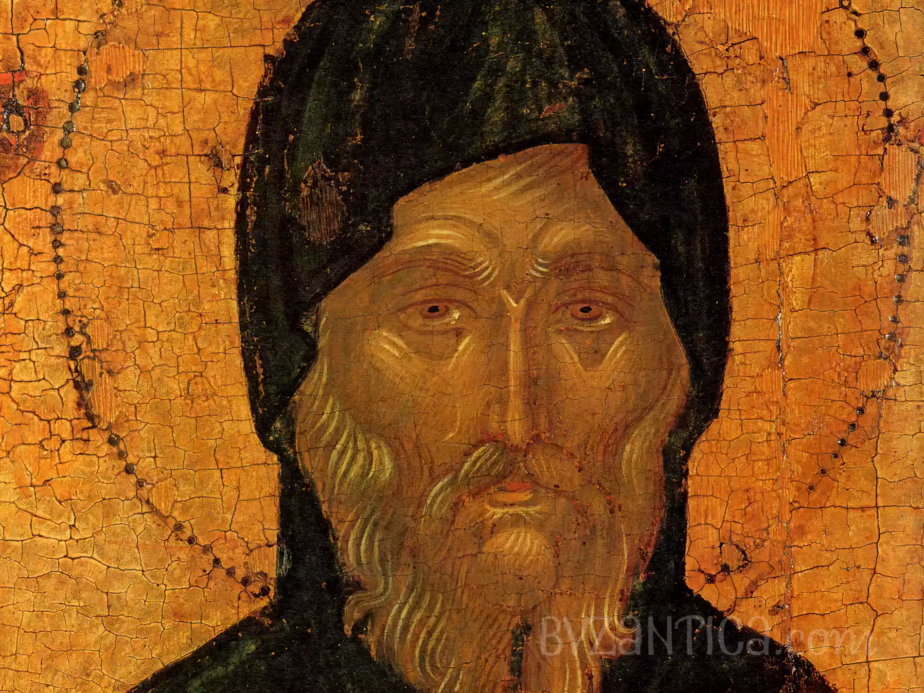 Detail of Saint Anthony icon in Kerkyra showing intense facial expression in byzantine icon