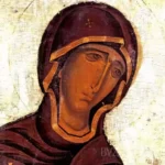 Close-up detail showing the face of the Theotokos Eleousa in Neophytos Monastery, with gold highlights and deep burgundy tones