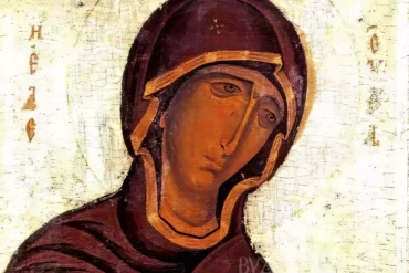 Close-up detail showing the face of the Theotokos Eleousa in Neophytos Monastery, with gold highlights and deep burgundy tones