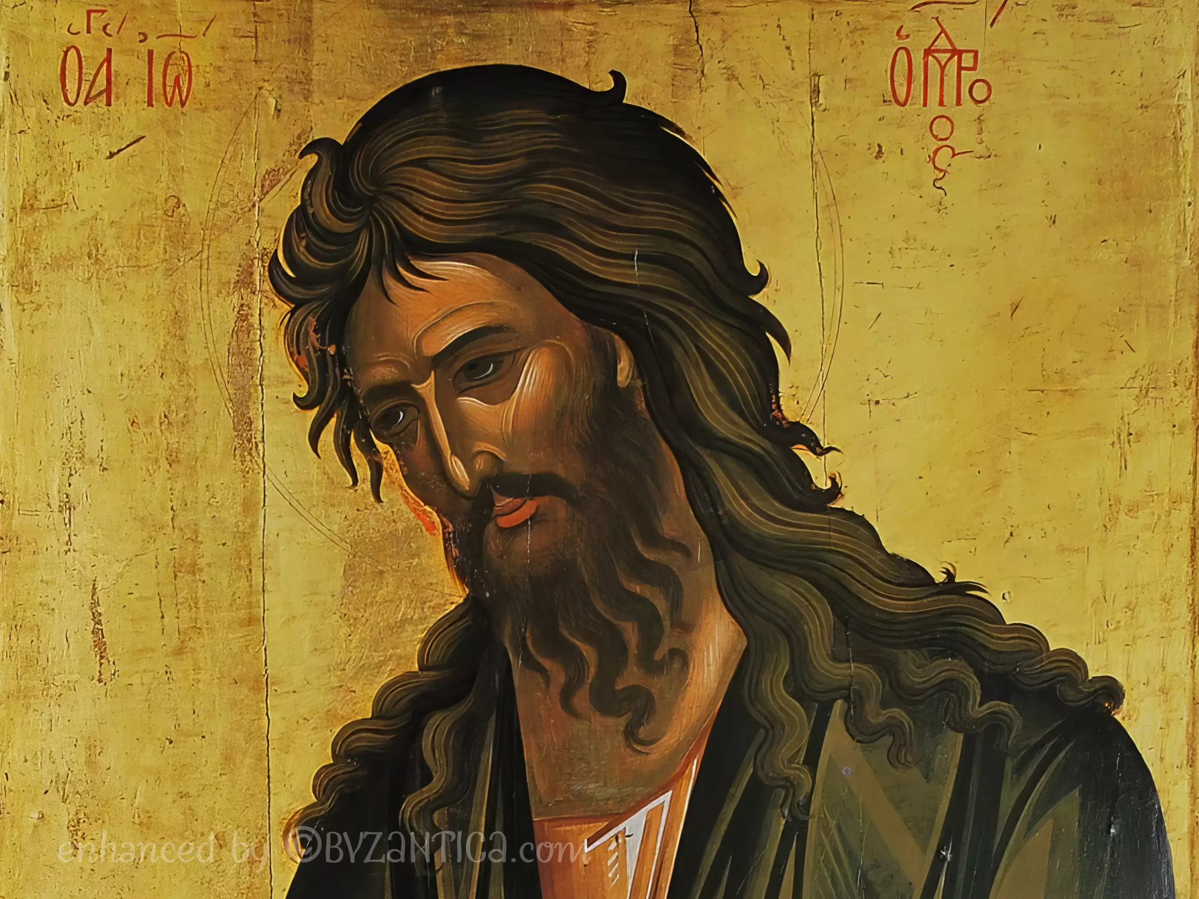 Intense close-up detail of John Baptist Deisis in Dionysiou icon showing contemplative expression