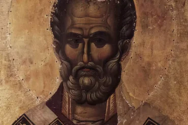 Hilandar Saint Nicholas Byzantine icon close view of saint's face with intense gaze and beard, UHD quality