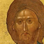 Pantocrator icon of Vatopedi: Close-up detail showing Christ's penetrating gaze against gold leaf background