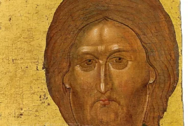 Pantocrator icon of Vatopedi: Close-up detail showing Christ's penetrating gaze against gold leaf background