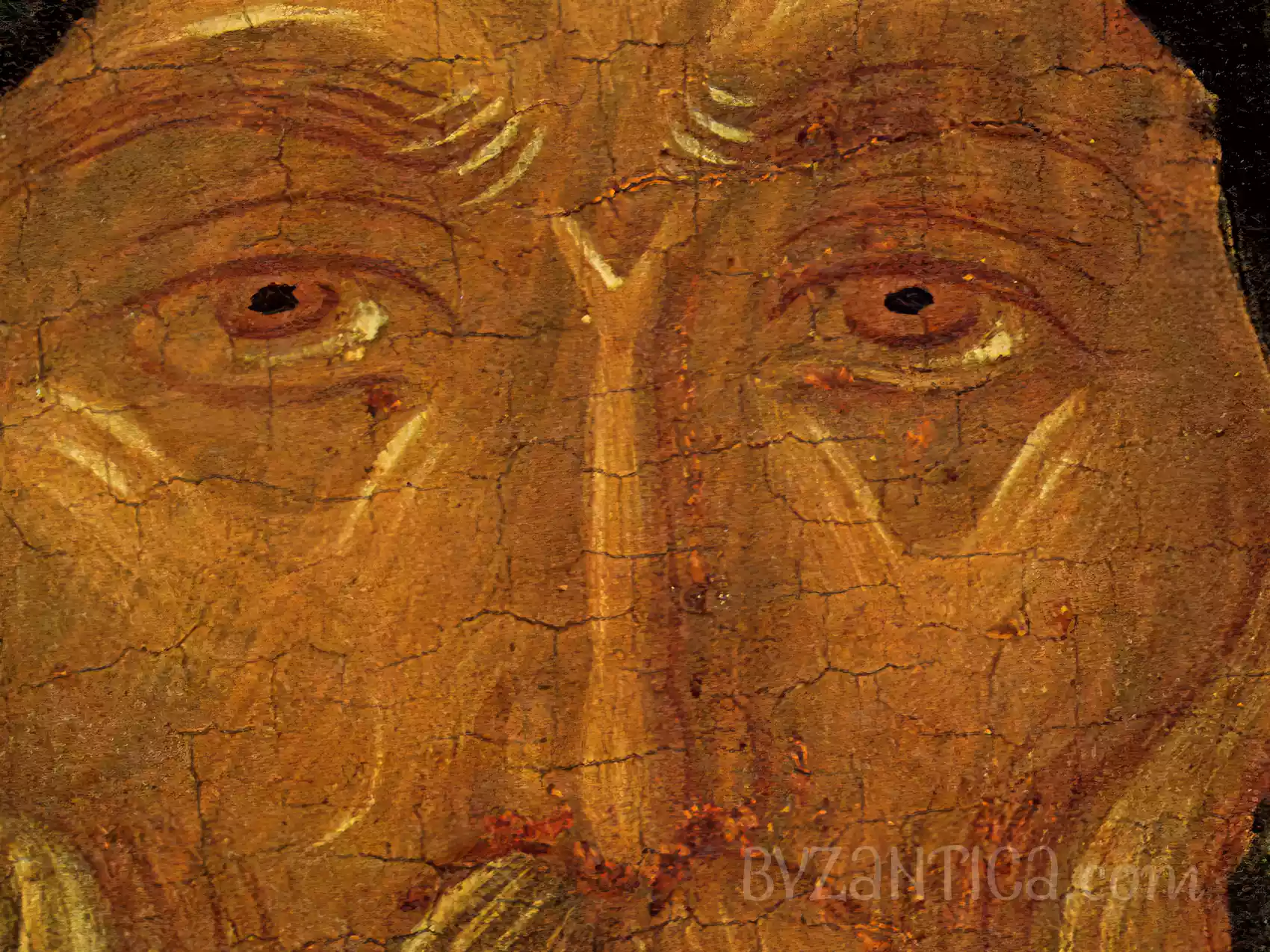 Close-up facial detail from Saint Anthony icon in Kerkyra reveals masterful byzantine technique