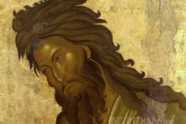 Detail view of Saint John Baptist in Vatopedi showing intense facial expression and flowing hair in Byzantine icon