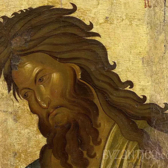 Detail view of Saint John Baptist in Vatopedi showing intense facial expression and flowing hair in Byzantine icon