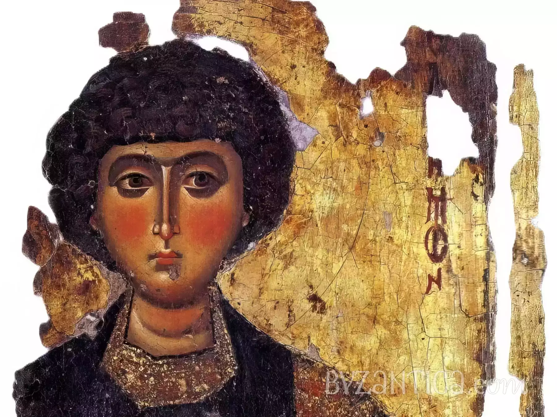 Detail of Saint Panteleimon icon in Megisti Lavra showing face against golden background, Byzantine icon