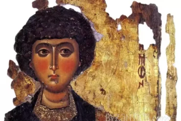 Detail of Saint Panteleimon icon in Megisti Lavra showing facial features against gold background, 12th-century Byzantine art