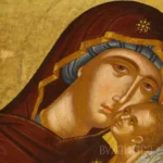 Intimate detail from Virgin Eleousa by Akotantos byzantine icon showing the tender embrace between Mother and Child