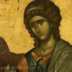 Archangel Gabriel in Vatopedi detail showing ethereal face with golden highlights against gold background