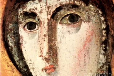 Detailed view of the Madonna's face from the 7th-century encaustic icon at St. Maria Nova