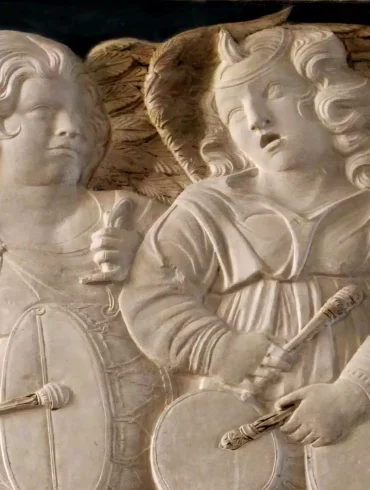 Malatesta Chapel sculptures featuring angelic musicians playing drums in exquisite marble relief